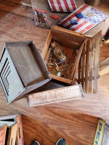 Industrial Lights w/ Crate, Wooden Storage Cabinet, and 7-UP Bottle Crate image
