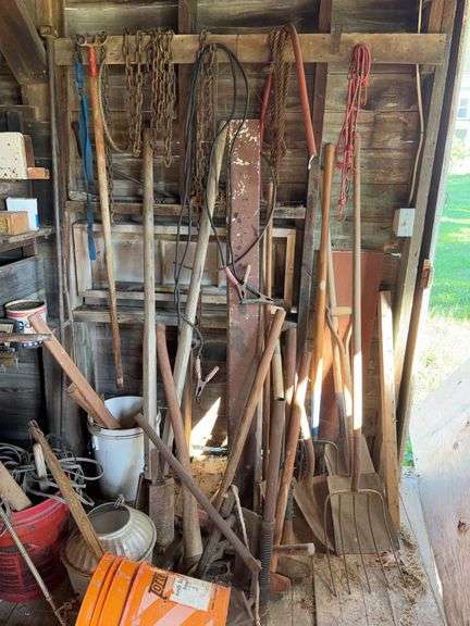 Assorted Long Handled Tools and Chains image