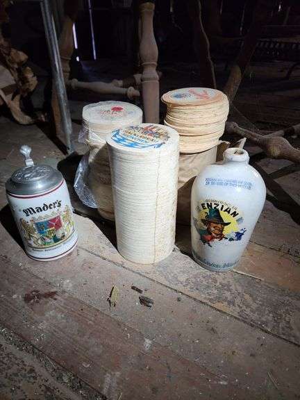 Decanter, Stein and Assorted Paper Coasters image