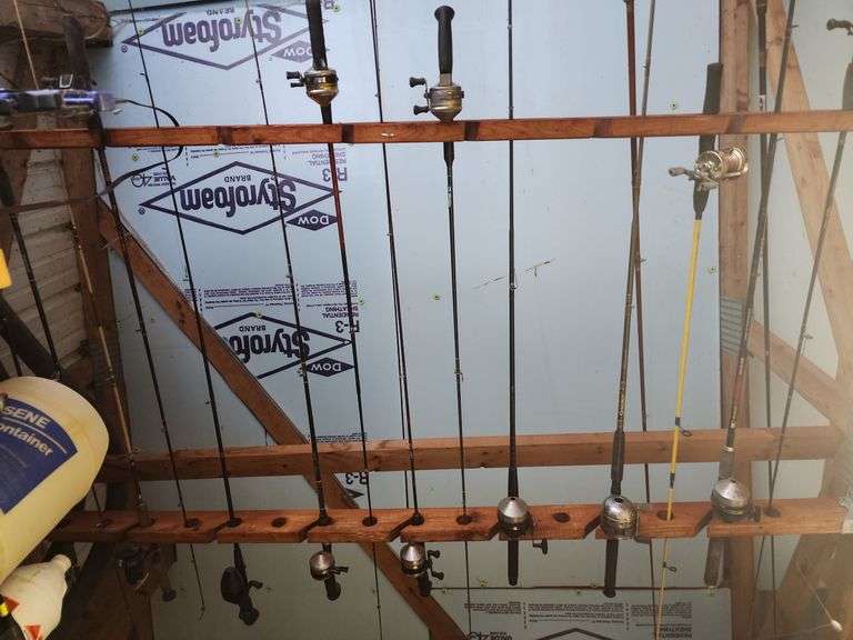 Large Assortment of Fishing Rods and Reels image