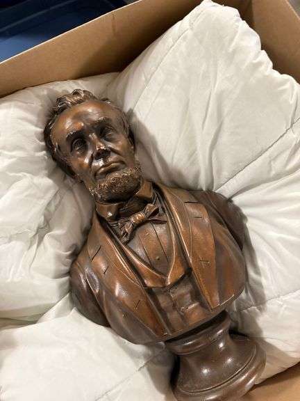 Abraham Lincoln bust and some comforters image