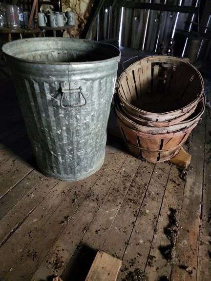 Peach Baskets and Metal Garbage Can image