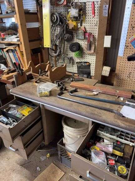 Contents of Desk and Wall pry bars tape measures misc Shopwares image