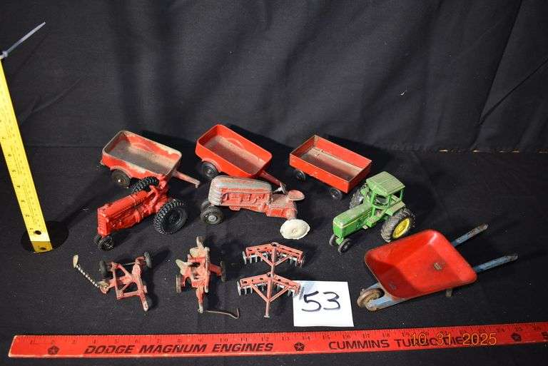Assortment of Farm Implements and Tractors image
