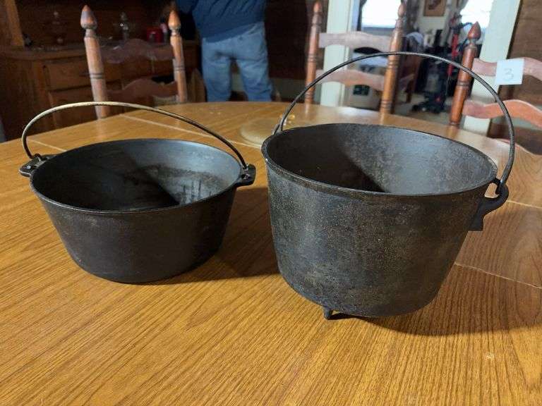 Pair of Cast Iron Pots - one footed image