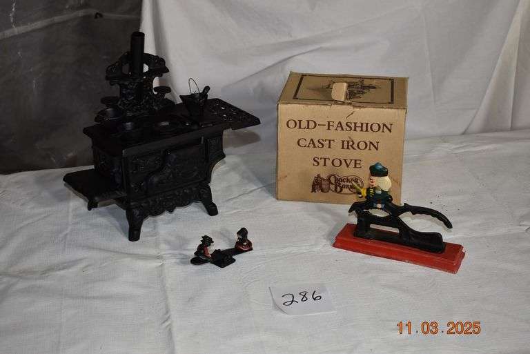 Mini Cast Iron Stove, Cast Iron Nut Cracker and Cast Iron See Saw with Kids image
