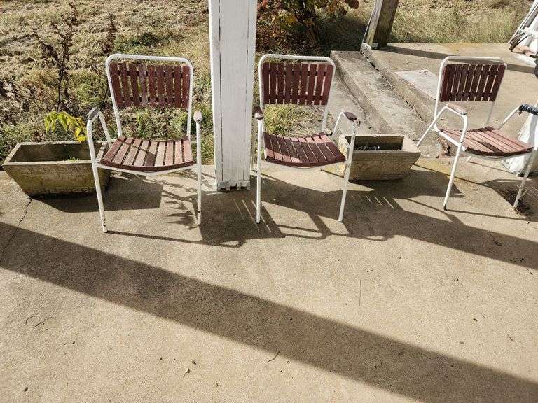 (2) Concrete Planters 20"x10"x10"and (3) Outdoor Patio Chairs and a table image