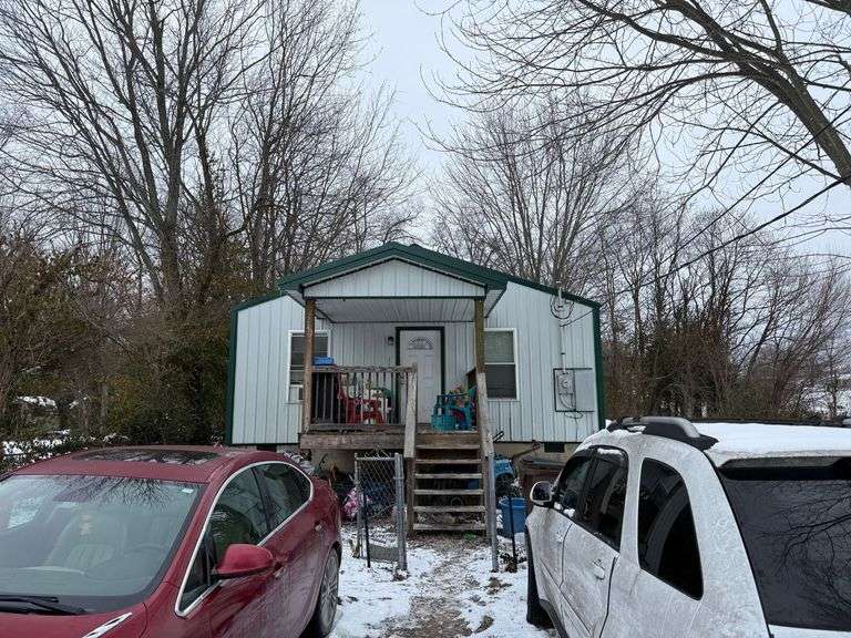 248 Merriweather Avenue, Eminence, KY 40019   Single family home with three bedrooms, two baths, in need of some repair.  Good location and good renters in place that pay $600 per month and tenant pays all utilities. image