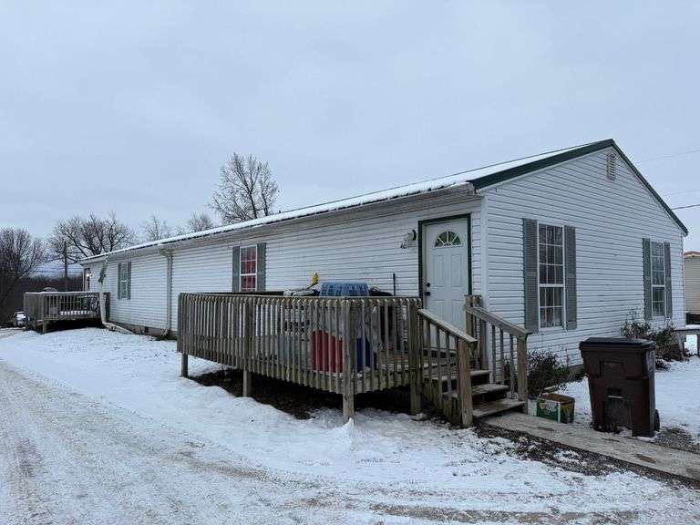 4669-4671 Jackson Road, Eminence, KY 40019.  Nice duplex and each unit is two bedrooms, 2 baths, large utility room, kitchen, and living room. image