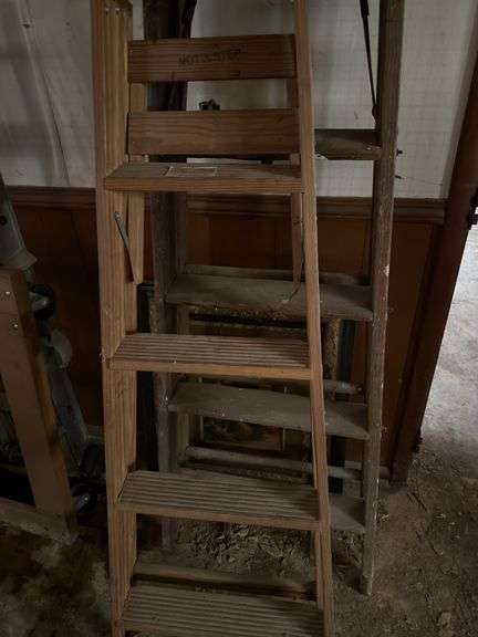 2 wooden step ladders