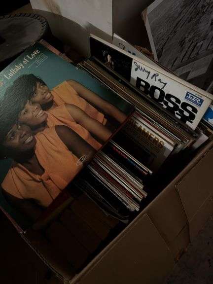 Records shelves ice skates old typewriter