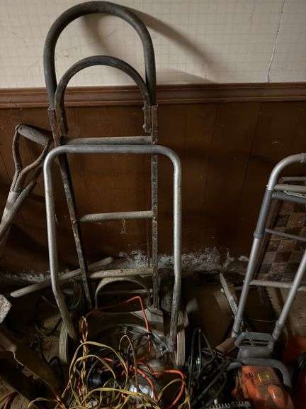 Hand cart extension cords chainsaw and leaf blowers