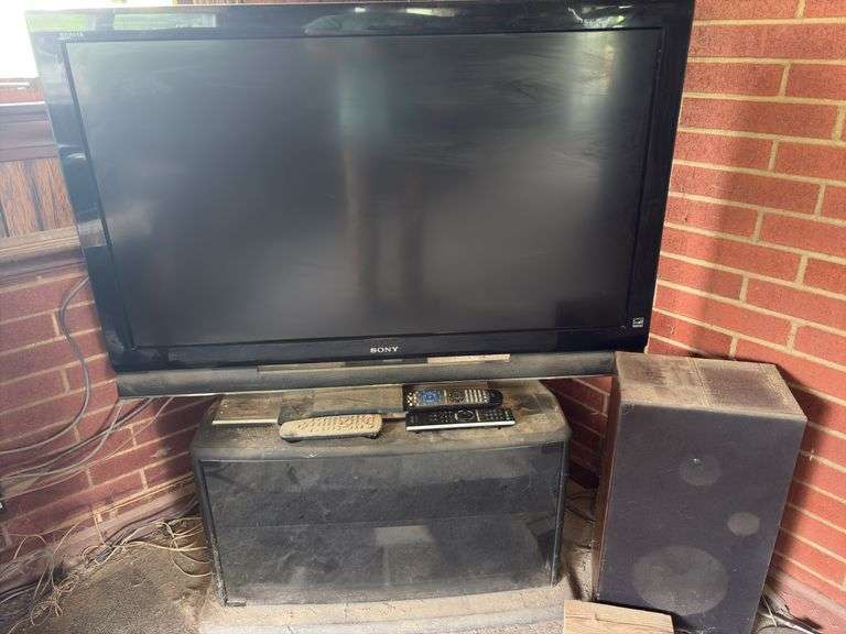 46” Sony Tv with Entertainment Stand, Drop Leaf Table, Speakers, Recievers, etc