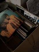 Records shelves ice skates old typewriter