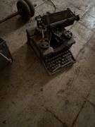 Records shelves ice skates old typewriter