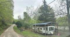 PIERCY ESTATE, .4 ACRE LOT ON ROUGH RIVER, CAMPER SOLD AS IS
