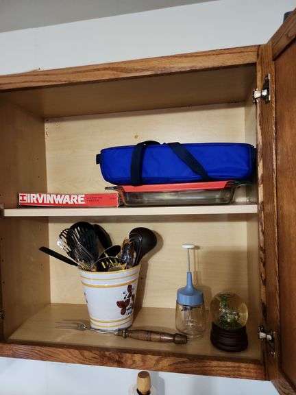 Contents of Cabinet - Servimg Utensils and Assorted Kitchenware image