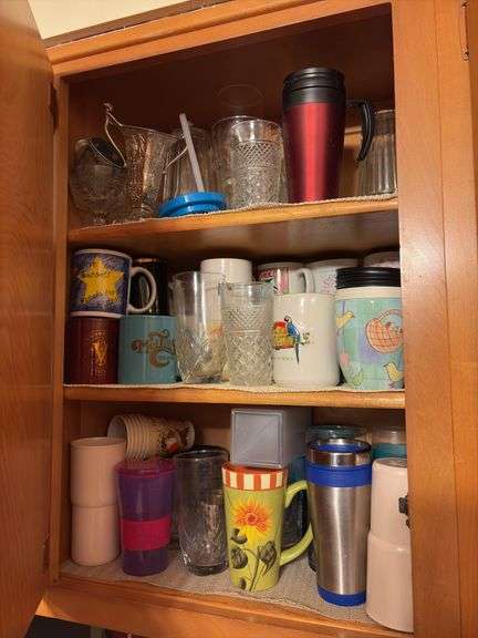 Contents of Cabinet - assorted cups and drinking glasses