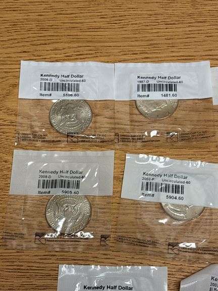 (11) JFK Half Dollars