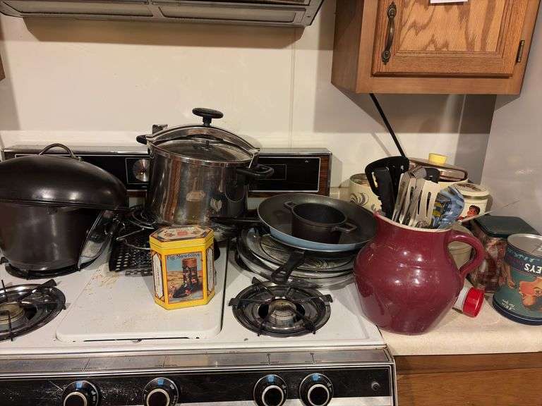 Assorted Pots and Pans and Canisters