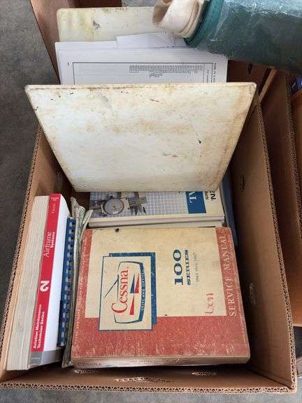 2 Boxes of Assorted Aviation Manuals Books and Cassets