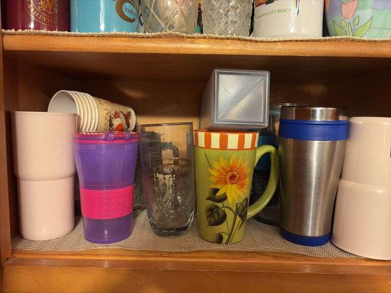 Contents of Cabinet - assorted cups and drinking glasses