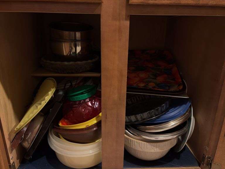 Contents of Cabinet - assortment of dishes, pots, misc