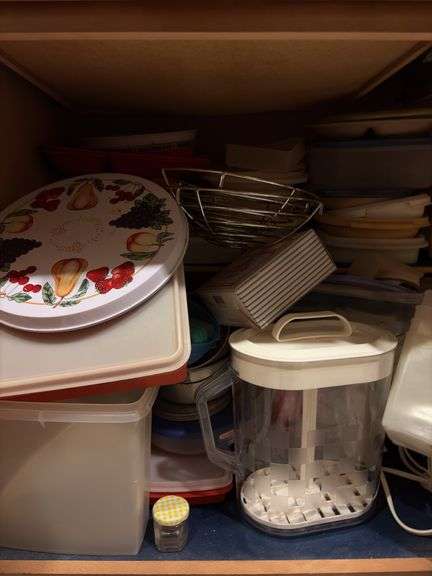 Contents of Cabinet - huge assortment of plastic storage containers