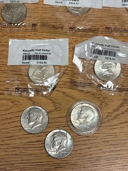 (11) JFK Half Dollars
