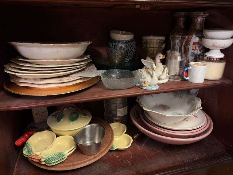 Contents of Lower Cabinet - serving bowls, plates, cups, misc