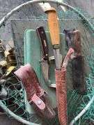 Assorted Fishing Tackel, Knives, and animal trap
