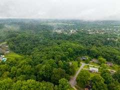 20-acre parcel located in River Bluff development off of the streets of Cherry Tree Drive and Creekview Drive.