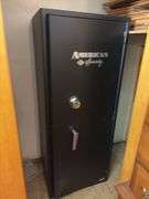 American Security Gun Safe - located in basement, buyer is responsible for removal, no loading help provided - door is open and in locked position- code unknown - 22”W x 18”D x 54.5”H