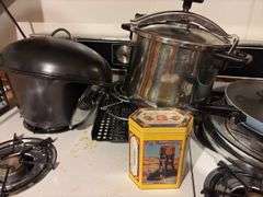 Assorted Pots and Pans and Canisters
