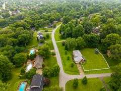 20-acre parcel located in River Bluff development off of the streets of Cherry Tree Drive and Creekview Drive.