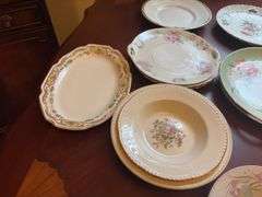 Large Group of Assorted Serving Plates & Dollies