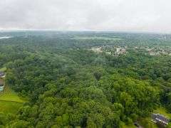 20-acre parcel located in River Bluff development off of the streets of Cherry Tree Drive and Creekview Drive.