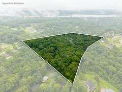 20-acre parcel located in River Bluff development off of the streets of Cherry Tree Drive and Creekview Drive.