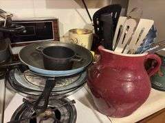 Assorted Pots and Pans and Canisters