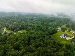 20-acre parcel located in River Bluff development off of the streets of Cherry Tree Drive and Creekview Drive.