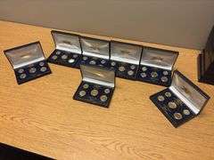 (7) 1999 US Coin 24K Gold Plated Coin Sets - one is incomplete