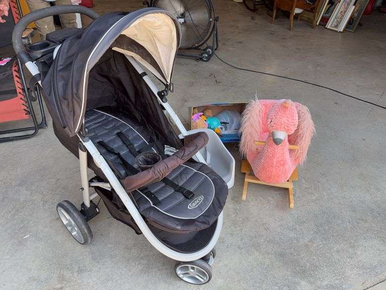 Baby Stroller and Assorted Baby Supplies image