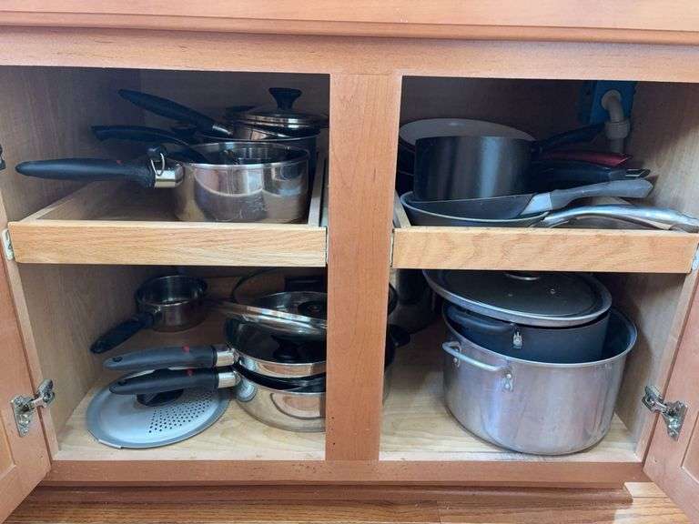 Contents of Kitchen Cabinet - Assorted Pots and Pans image