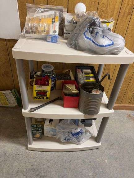 Shelving Unit with Lightbulbs and Fasteners image