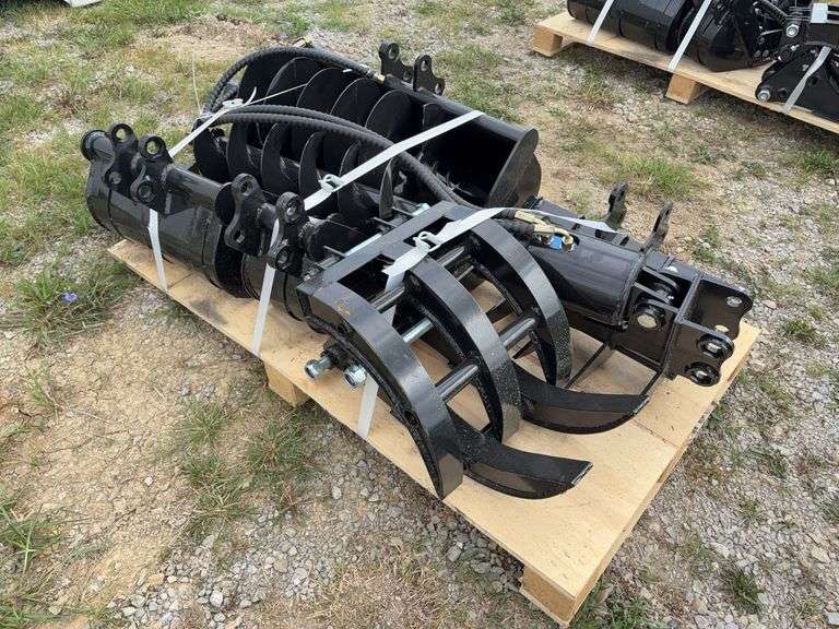 Pallet of (9) Mini Excavator Attachments - (1) 8” Bucket, (1) 20” Bucket, (1) 32” Bucket, (1) Quick Coupler, (1) Ripper, (1) Grapple, (1) Rake, (1) 8” Auger, (1) 12” Auger image