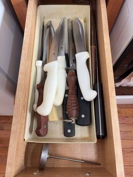 Contents of Kitchen Cabinet - Utensils and Baskets image