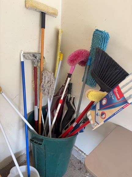 Assorted Long Handled Tools and Cleaning Supplies image