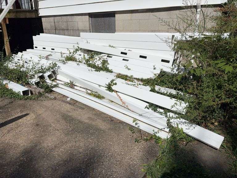 Assorted Vinyl Fence Pieces - 7’ Posts & 16’ Slats - piece count unknown image