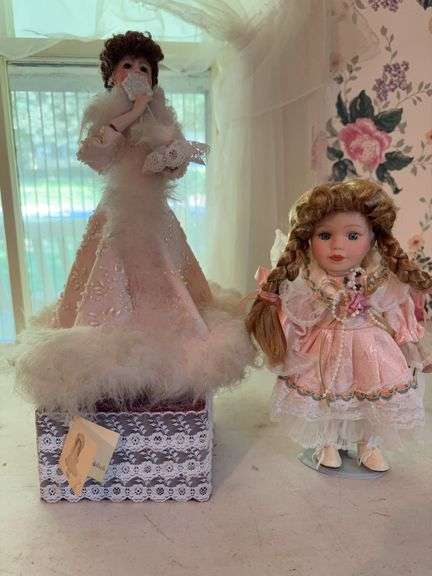 Pair of Porcelain Dolls on Music Box and Stand image