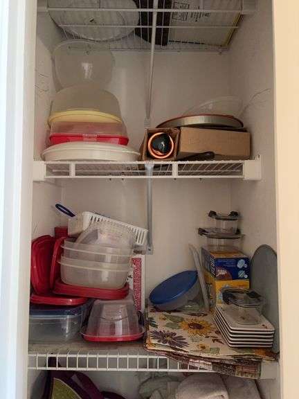 Contents of Closet - assorted container and linens image